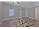 Spacious bedroom featuring updated flooring and modern ceiling fan at 2812 Tom Brewer Ln, Plant City, FL 33566