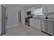 Updated kitchen features stainless steel appliances and granite counters at 2812 Tom Brewer Ln, Plant City, FL 33566
