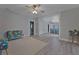 Inviting living room featuring hardwood floors, neutral walls, and an open floor plan at 2812 Tom Brewer Ln, Plant City, FL 33566