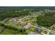 An aerial view shows the property's location in a well-planned neighborhood with a pond at 2839 Cordoba Ranch Blvd, Lutz, FL 33559