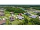 Expansive aerial view of a home showcasing its well-maintained lawn, landscaping, and neighborhood at 2839 Cordoba Ranch Blvd, Lutz, FL 33559