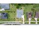 Top down aerial view of a home with gray roof and well-manicured landscaping at 2839 Cordoba Ranch Blvd, Lutz, FL 33559