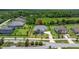 Aerial view of a single-Gathering home with mature trees and landscaping at 2839 Cordoba Ranch Blvd, Lutz, FL 33559