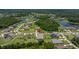 Aerial view showcasing the home's location within a neighborhood with ponds and green spaces at 2839 Cordoba Ranch Blvd, Lutz, FL 33559