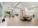 Expansive open-concept living room seamlessly connects the dining area, kitchen, and lounge spaces at 2839 Cordoba Ranch Blvd, Lutz, FL 33559