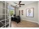 Bright home office featuring elegant furniture and a serene outdoor view at 2839 Cordoba Ranch Blvd, Lutz, FL 33559