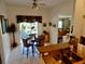 Charming breakfast nook complemented by a great view and a functional kitchen with stainless steel sink at 29413 Caddyshack Ln, San Antonio, FL 33576