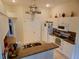 Functional kitchen featuring granite countertops, white cabinets, and stainless steel appliances, ready for culinary adventures at 29413 Caddyshack Ln, San Antonio, FL 33576