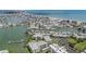 Breathtaking aerial view of waterfront community with beach access and boat docks in a beautiful coastal setting at 399 150Th Ave # 315, Madeira Beach, FL 33708