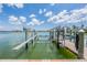 Boat lift near the water on a sunny day, great for boat owners at 399 150Th Ave # 315, Madeira Beach, FL 33708