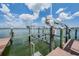New boat lift on a sunny day, ideal for water activities at 399 150Th Ave # 315, Madeira Beach, FL 33708
