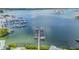 Birds eye view of the docks extending out to the water and surrounding scenery at 399 150Th Ave # 315, Madeira Beach, FL 33708