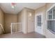 Hallway entrance showing door 315, overhead lighting, and window at 399 150Th Ave # 315, Madeira Beach, FL 33708