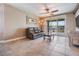 A relaxing living area that includes tile floors and sliding door access to the balcony at 399 150Th Ave # 315, Madeira Beach, FL 33708