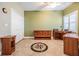 A spacious room with tile flooring, a ceiling fan, and a closet for ample storage at 399 150Th Ave # 315, Madeira Beach, FL 33708