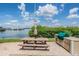 Outdoor kitchen and picnic table with scenic bay views at 399 150Th Ave # 315, Madeira Beach, FL 33708