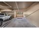 Well-lit parking garage with assigned space, and a truck parked in the spot at 399 150Th Ave # 315, Madeira Beach, FL 33708