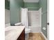 Well maintained bathroom with tub, shower, single sink and neutral colored wall paint at 4079 Pacente Loop, Wesley Chapel, FL 33543