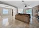 Spacious living room with tile flooring, neutral paint, and an open floor plan at 4079 Pacente Loop, Wesley Chapel, FL 33543