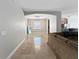 Open concept living room with views into the dining room and kitchen at 4079 Pacente Loop, Wesley Chapel, FL 33543
