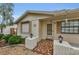 The home's entrance with decorative brickwork and classic fixtures at 4143 Gray Squirrel Ln, New Port Richey, FL 34653