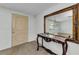 Foyer featuring a large mirror and elegant console table at 4143 Gray Squirrel Ln, New Port Richey, FL 34653