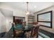 Stylish dining area with marble floors, a wrought iron shelf, and a large window at 4146 Harbor Hills Dr, Largo, FL 33770