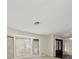 Bright living room with a large bay window offering natural light and neighborhood views at 4146 Harbor Hills Dr, Largo, FL 33770