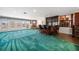 Open concept with a wet bar, and French doors that lead to outdoor entertainment spaces at 4146 Harbor Hills Dr, Largo, FL 33770