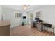 Bedroom featuring neutral walls and wood-look flooring, providing a comfortable and functional space at 4252 Floramar Ter, New Port Richey, FL 34652