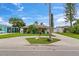 Charming single-story home with a spacious lawn, long driveway, and vibrant landscaping at 4252 Floramar Ter, New Port Richey, FL 34652