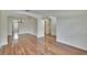 Spacious living room with hardwood floors, high ceilings, and ample natural light at 4634 Mapletree Loop, Wesley Chapel, FL 33544