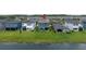 Back view of house showing its backyard, and serene waterfront view at 4644 San Martino Dr, Wesley Chapel, FL 33543
