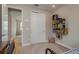 This bedroom has neutral-colored walls, a closet, and a unique shelving unit for storage at 4644 San Martino Dr, Wesley Chapel, FL 33543