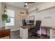 Functional home office offers a dedicated workspace with sleek furniture, natural light, and a calming ambiance for productivity at 4644 San Martino Dr, Wesley Chapel, FL 33543