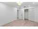 Spacious bedroom offers wood flooring, a closet, and access to a hallway at 4708 W Neptune St, Tampa, FL 33629