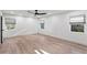 Spacious bedroom with neutral walls, light wood flooring, and ample natural light at 4708 W Neptune St, Tampa, FL 33629