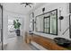 Hallway featuring decor and ample lighting at 4708 W Neptune St, Tampa, FL 33629