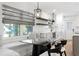 Eat in kitchen with bar seating, stainless appliances, and large windows for lots of light at 4708 W Neptune St, Tampa, FL 33629