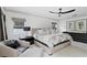 Spacious main bedroom with neutral decor, ceiling fan, and ample natural light at 4708 W Neptune St, Tampa, FL 33629