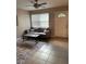 Cozy living room features a comfortable couch and a decorative area rug at 4721 W Wallace Ave, Tampa, FL 33611