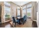 Formal dining room with many windows letting in natural light at 6007 Quartz Lake Way, Lithia, FL 33547