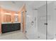 Stylish bathroom with a double vanity, walk-in shower, and modern fixtures at 605 Bosphorous Ave, Tampa, FL 33606