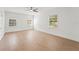 Bright bedroom featuring tile floors, a ceiling fan, and windows for natural light at 605 Bosphorous Ave, Tampa, FL 33606