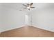 Empty bedroom features tile flooring, ceiling fan, and two closets at 605 Bosphorous Ave, Tampa, FL 33606