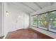 Bright entry area with decorative floor tiles and a large window with blinds at 605 Bosphorous Ave, Tampa, FL 33606