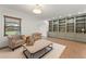 Cozy living room with built-in shelving, neutral tones, and comfortable seating arrangement at 605 Bosphorous Ave, Tampa, FL 33606