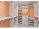 Organized walk-in closet with custom shelving and drawers at 605 Bosphorous Ave, Tampa, FL 33606