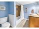 Bright bathroom featuring a tub-shower combo with tile accents and modern fixtures at 6600 Sunset Way # 118, St Pete Beach, FL 33706