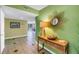 Inviting entryway with decor, modern flooring, and light, open space leading into the main living area at 6600 Sunset Way # 118, St Pete Beach, FL 33706
